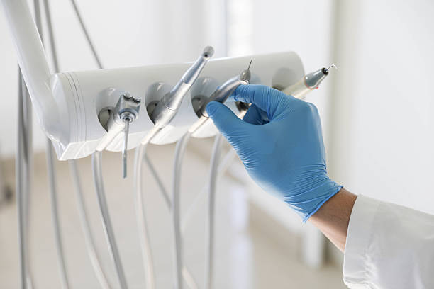 Professional Invisalign Clear Aligners technician working in Riverside, NY